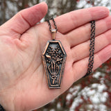 Skeleton Hand Holding Lily of the Valley Copper Necklace