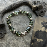 Uranium Glass Skull Bracelet with Silver Plated Bead