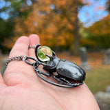 Five Horned Beetle Holding a Uranium Glass Marble Copper Necklace