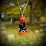 Hand Painted Witch Holding a Jack O’Lantern Blow Mold Necklace *Varnish Coated*