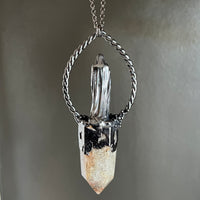 Cloaked Woman with Garden Quartz, and Peach Moonstone Necklace with Gunmetal Patina