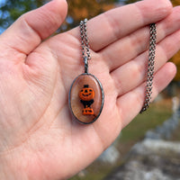 Cat and Jack O’ Lantern Small Oval Blow Mold Necklace A *Mockingbird Lane Exclusive*