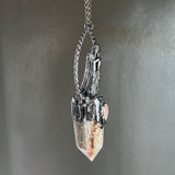 Cloaked Woman with Garden Quartz, and Peach Moonstone Necklace with Gunmetal Patina