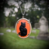 Black Cat on Orange Background Cameo Necklace