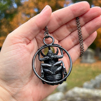 Five Horned Beetle Holding a Uranium Glass Marble Copper Necklace