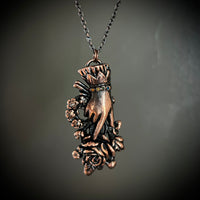 Sentimental Hand Holding Roses with Rainbow Crystals Copper Necklace