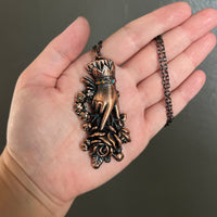 Sentimental Hand Holding Roses with Rainbow Crystals Copper Necklace
