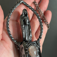 Cloaked Woman with Garden Quartz, and Peach Moonstone Necklace with Gunmetal Patina