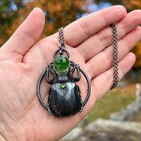 Five Horned Beetle Holding a Uranium Glass Marble Copper Necklace