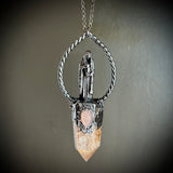 Cloaked Woman with Garden Quartz, and Peach Moonstone Necklace with Gunmetal Patina