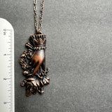 Sentimental Hand Holding Roses Copper Necklace