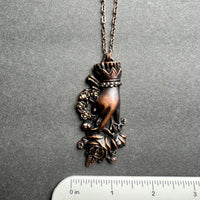 Sentimental Hand Holding Roses Copper Necklace